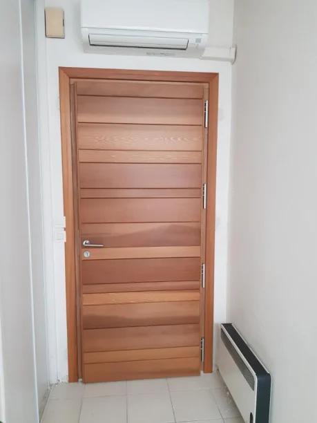 Porte d'entrée aluminium Profils Systèmes fabrication ALU TECH panneau Volma aspect bois intérieur Hérault vue intérieure